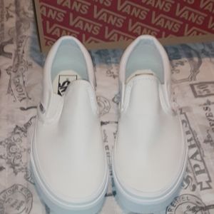 Brand new white vans slip on